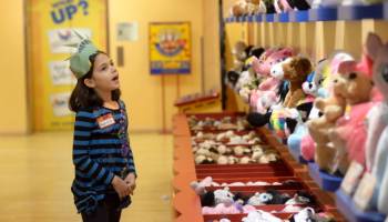 Build-A-Bear Workshop provides a tactile experience that can't be replaced by iPads and cellphones, says CEO Sharon Price John. In this photo, a guest attends the Build-A-Bear Workshop Make-A-Wish Event In New York City on February 6, 2014.