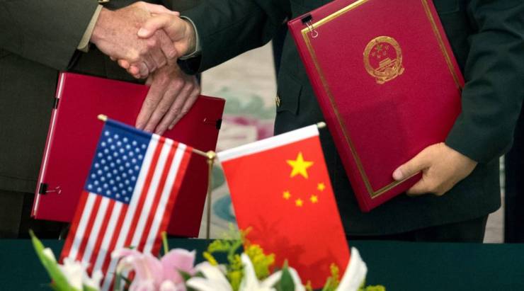 The American flag placed next to a Chinese flag.