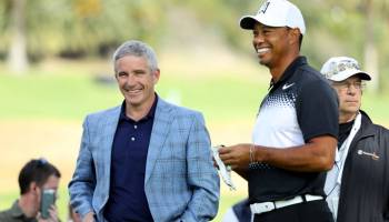 PGA Commissioner Jay Monahan (L) meets with Tiger Woods during the Pro-Am of the Genesis Open at the Riviera Country Club on February 14, 2018 in Pacific Palisades, California.