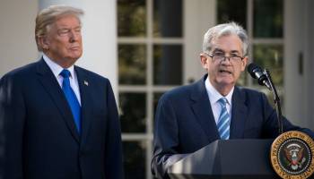 President Donald Trump looks on as his nominee for the chairman of the Federal Reserve, Jerome Powell, speaks during a press event at the White House last year.