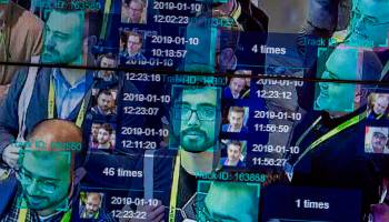 A live demonstration uses artificial intelligence and facial recognition in dense crowd spatial-temporal technology at the Horizon Robotics exhibit during CES 2019 in Las Vegas.