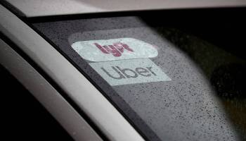 The Uber logo is displayed on a car in 2019 in San Francisco.
