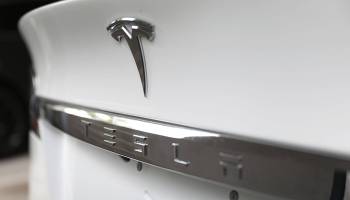 MIAMI, FLORIDA - APRIL 04: The Tesla emblem is seen on a vehicle on April 04, 2019 in Miami, Florida. Tesla announced a first quarter 31% drop in vehicles that were delivered to customers compared to the prior quarter. The news caused the stock to drop approximately 8%.(Photo by Joe Raedle/Getty Images)