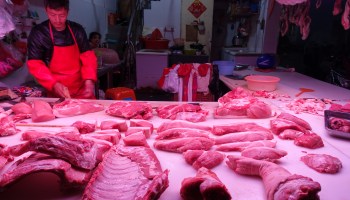 A local meat market in Shanghai is dominated by pork stands. Pork is a staple in the Chinese diet and accounts for 70% of all meat consumed in China.