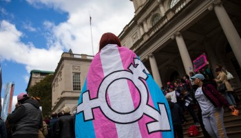 LGBT activists rally in support of transgender people on the steps of New York City Hall last year.