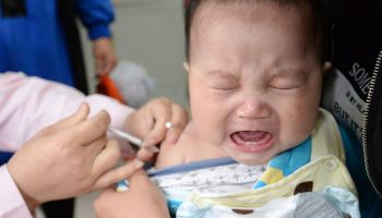 A child receives a vaccination at a hospital in China's northern Hebei province.