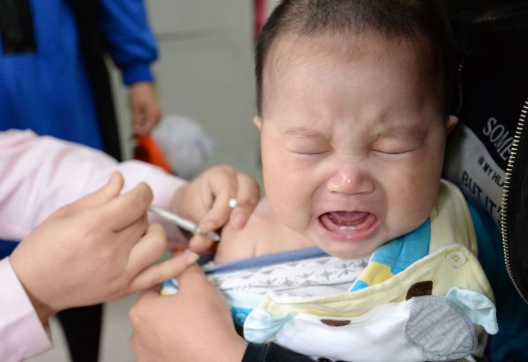 A child receives a vaccination at a hospital in China's northern Hebei province.