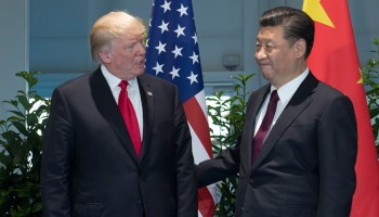 U.S. President Donald Trump and Chinese President Xi Jinping pose before a sideline meeting at the 2017 G-20 summit in Hamburg, Germany.