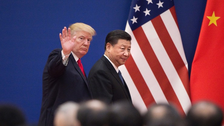 President Donald Trump and Chinese President Xi Jinping leave a business leaders event in Beijing in 2017.