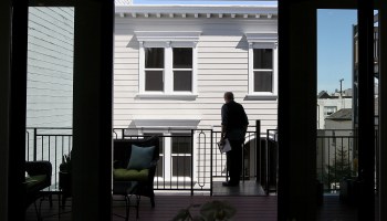 A real estate agent tours an open house in San Francisco, California.
