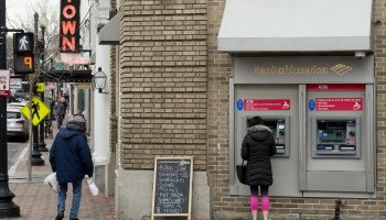 A woman uses an ATM in Washington, D.C. in 2017.