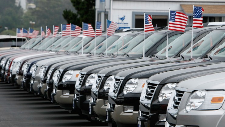 A row of new Ford trucks at a Ford dealership in Colma, California.