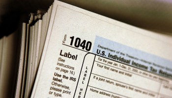 A 1040 individual income tax return form.
