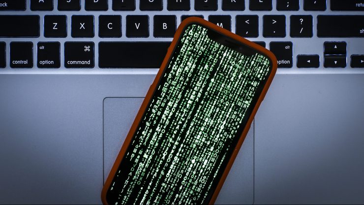 Matrix style graphics are seen on an Apple iPhone in this photo illustration.