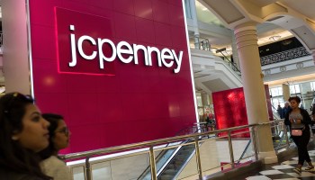 Shoppers in the Manhattan Mall walk past a sign for a J.C. Penney department store in 2017 in the Herald Square neighborhood in New York City.