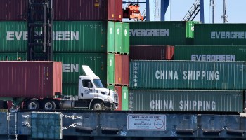 Shipping containers from China and other nations are unloaded at the Port of Long Beach in California in February.