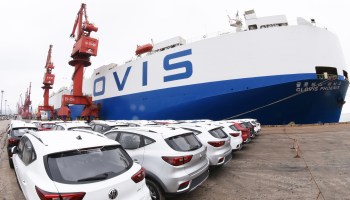 Cars produced by SAIC Motor Corp. wait to be exported to the U.S. at a port in Lianyungang in China's eastern Jiangsu province in 2018. China's new tariffs affect U.S. cars being exported to China.