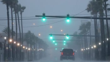 Heavy wind and rain caused by Hurricane Dorian hit Main Street on Sept. 4 in Daytona Beach, Florida.