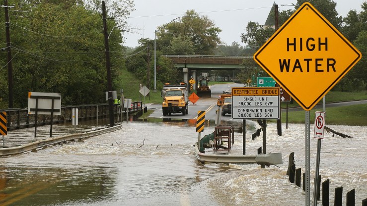 Patuxent River floodwaters flow over Water Street on Sept. 9, 2011, in Upper Marlboro, Maryland.