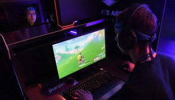 Gamers play "Fortnite" against Twitch streamer and professional gamer Tyler "Ninja" Blevins during Ninja Vegas '18 at Esports Arena Las Vegas in April 2018.