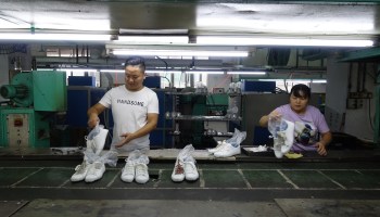 Workers at Changjian Shoe factory in Dongguan city.