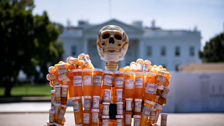 Pill Man, a skeleton made from Frank Huntley's oxycontin and methadone prescription bottles, is seen on Pennsylvania Avenue in front of the White House August 30, 2019, in Washington, DC.