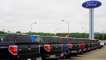 Ford F-150s are lined up at a dealership in Hudson, Wisconsin.