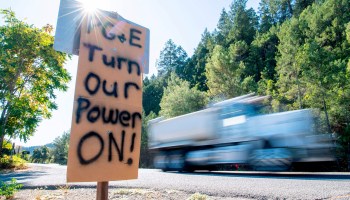 A sign in Calistoga, California, calls on PG&E to turn the electricity back on during a statewide blackout in October 2019.