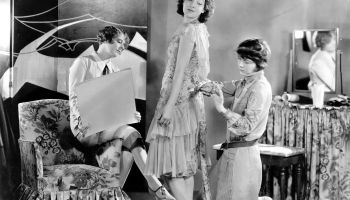 A dress fitting circa 1930, when synthetic fabrics were new to the market.