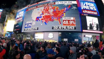 In the aftermath of the 2016 election, Democrats and Republicans shared differing maps that highlighted their respective strengths, wrote Alberto Cairo. Above, people gather in Times Square on November 8, 2016, Election Day.