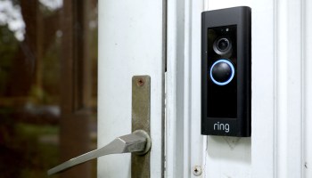 A closeup of a Ring doorbell security camera.