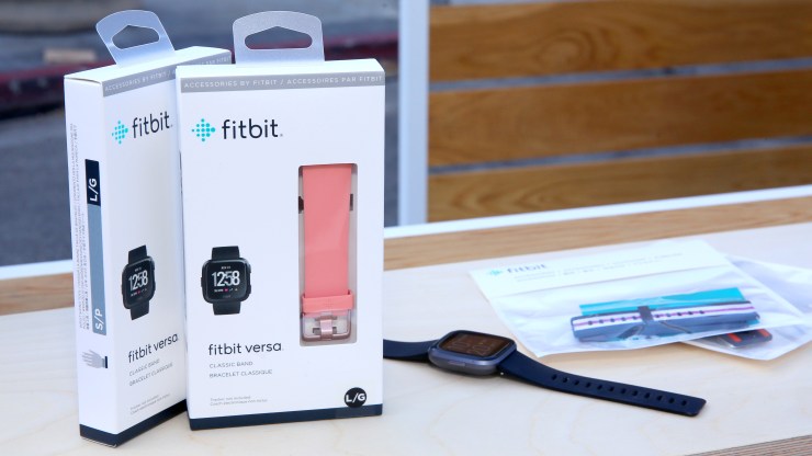 Fitbit's trove of data is all about social determinants of health, says Kirsten Ostherr of Rice University. Above, Fitbit devices in the box.