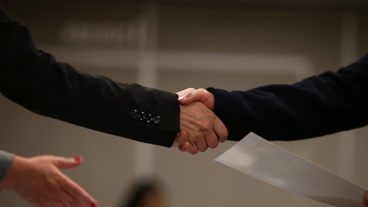 Closeup of shaking hands.
