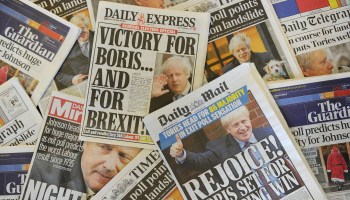 An arrangement of UK daily newspapers photographed as an illustration in London on December 13, 2019 shows front page headlines reporting on the projected election result based on exit polls in the UK general election.