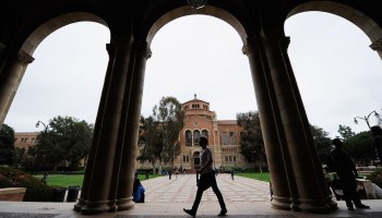 A student walking on the University of California, Los Angeles, campus.