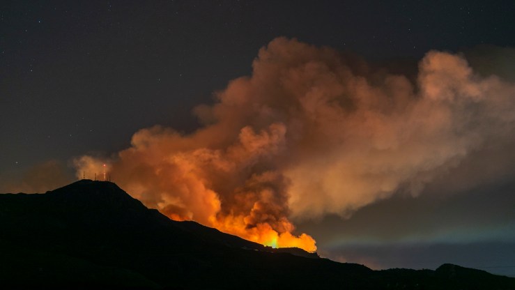 The Maria Fire burns on a hillside as it expands up to 8,000 acres on its first night on Nov. 1 near Somis, California.