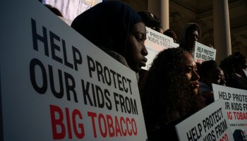 People take part in a rally at the steps of City Hall after New York City Council vote on legislation to ban flavored e-cigarettes on November 26, 2019.