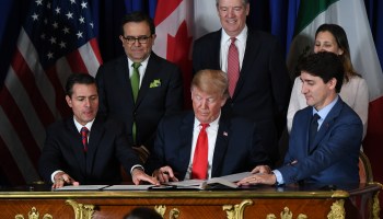Mexican President Enrique Pena Nieto, U.S. President Donald Trump and Canadian Prime Minister Justin Trudeau, sign the USMCA.