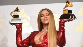 Beyoncé poses with her Grammy wins at the 59th Grammy Awards in 2017 in Los Angeles, California.