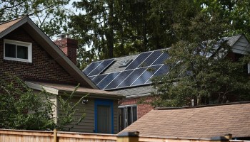 Solar panels on a house roof.