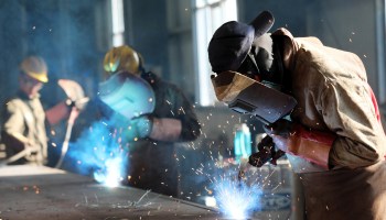 A worker cutting steel at a factory in Huaibei in China's eastern Anhui province in May 2018.
