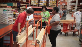 Customers shop at a Home Depot store on July 26, 2017 in Chicago, Illinois