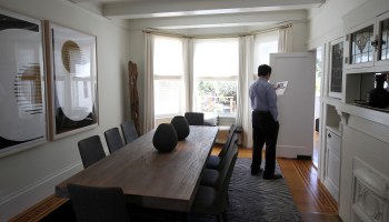 A real estate agent tours a home for sale in April 2019 in San Francisco, California.