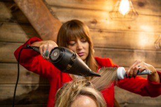 Ashley Nelson dyes, cuts and styles the hair of real estate agent, Dawn Templeton, at Collab Salon in Boise, ID. 