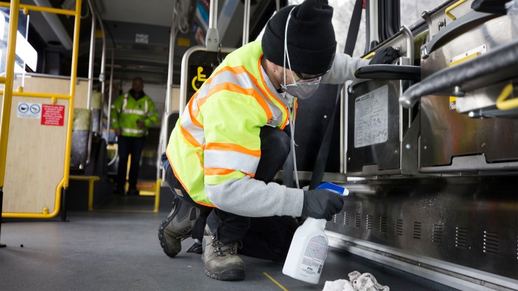 A utility service worker for King County Metro deep cleans a metro bus on March 3, 2020 in Seattle, Washington.