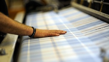 Cloth is produced in the Lochcarron Tartan Factory in the Scottish town of Selkirk in 2016.