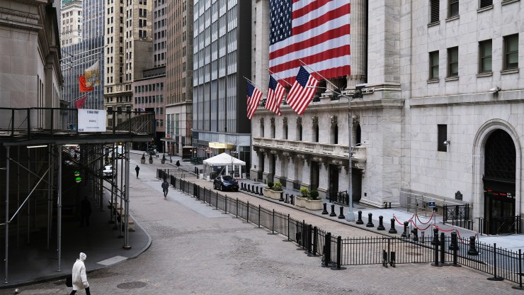 Wall Street stands empty in a scene from March 2020.