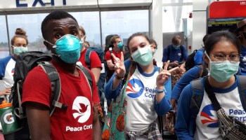 Peace Corps volunteers evacuating from their assignments
