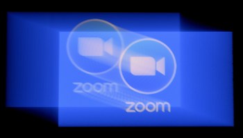 The Zoom logo on a screen.