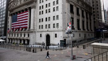 An all-but-deserted Wall Street. The Fed is making new moves to support corporate debt.